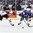BUFFALO, NEW YORK - DECEMBER 29: Canada's Boris Katchouk #12 and USA's Scott Perunovich #15 battle for the puck during preliminary round action at the 2018 IIHF World Junior Championship. (Photo by Matt Zambonin/HHOF-IIHF Images)

